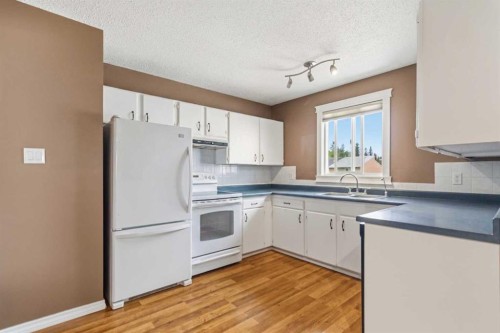 157 Rogers Crescent, Fort Mcmurray, AB - Indoor Photo Showing Kitchen With Double Sink