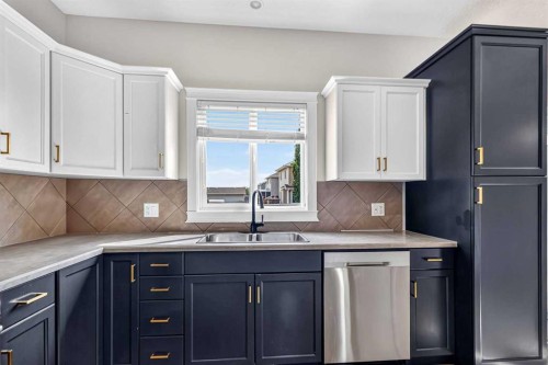 229 Heritage Drive, Fort Mcmurray, AB - Indoor Photo Showing Kitchen With Double Sink