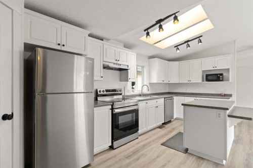 240 Mckinlay Crescent, Fort Mcmurray, AB - Indoor Photo Showing Kitchen