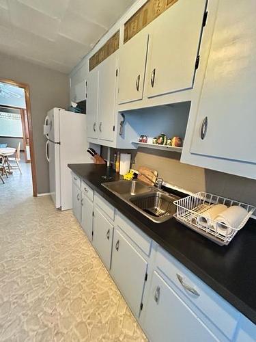 4901 50 Street, Hardisty, AB - Indoor Photo Showing Kitchen With Double Sink