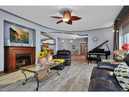 28125 Hwy 587, Rural Red Deer County, AB - Indoor Photo Showing Living Room With Fireplace