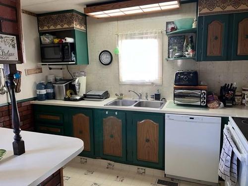 5008 47 Street, Hardisty, AB - Indoor Photo Showing Kitchen With Double Sink