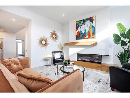 4191 Ryders Ridge Boulevard, Sylvan Lake, AB - Indoor Photo Showing Living Room With Fireplace