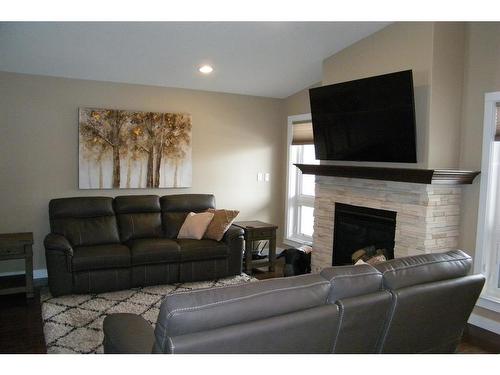 5006 47 Avenue, Forestburg, AB - Indoor Photo Showing Living Room With Fireplace