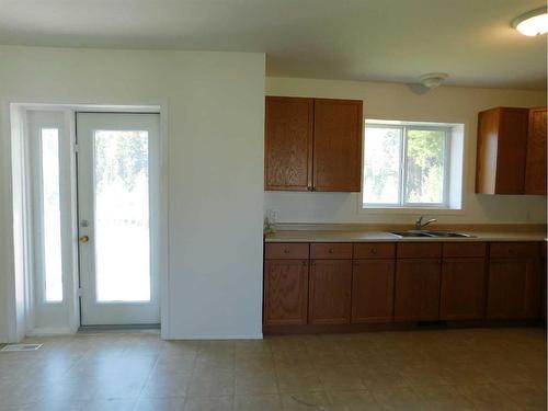 4917,4918,4919,4920 59 Street Close, Rocky Mountain House, AB - Indoor Photo Showing Kitchen With Double Sink