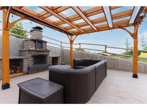 7 Aspen Ridge Close, White Sands, AB - Outdoor With Fireplace With Exterior