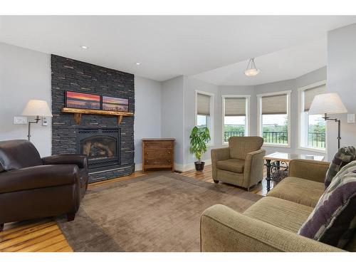 7 Aspen Ridge Close, White Sands, AB - Indoor Photo Showing Living Room With Fireplace
