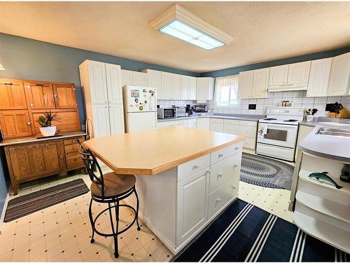 2718 Jackson Street, Wabasca, AB - Indoor Photo Showing Kitchen With Double Sink