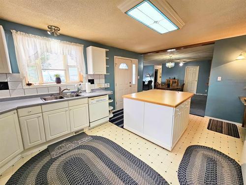 2718 Jackson Street, Wabasca, AB - Indoor Photo Showing Kitchen With Double Sink