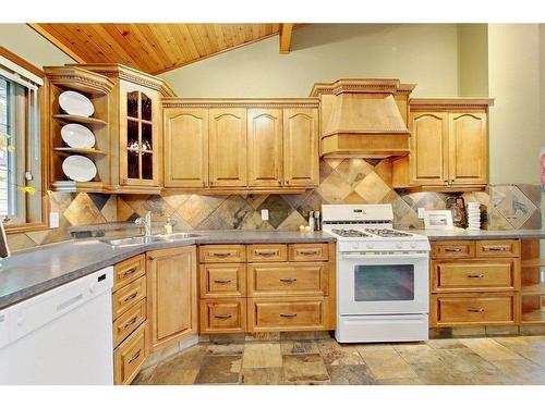 138-36240 Range Road 250, Rural Red Deer County, AB - Indoor Photo Showing Kitchen With Double Sink