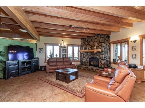 41115 Range Road 272, Rural Lacombe County, AB - Indoor Photo Showing Living Room With Fireplace