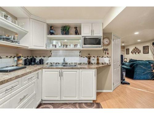 2439 41 Street Se, Calgary, AB - Indoor Photo Showing Kitchen With Double Sink