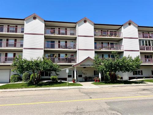 207-5020 49 Street, Rocky Mountain House, AB - Outdoor With Balcony With Facade