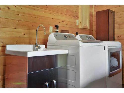 18 West Country Boulevard, Rural Clearwater County, AB - Indoor Photo Showing Laundry Room