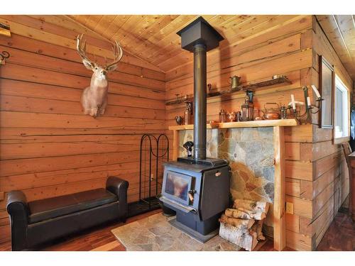 18 West Country Boulevard, Rural Clearwater County, AB - Indoor With Fireplace