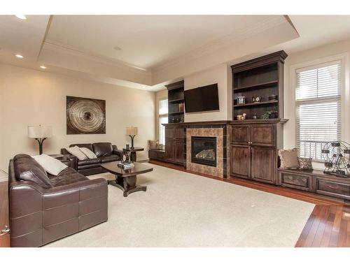 36 Sawyer Close, Red Deer, AB - Indoor Photo Showing Living Room With Fireplace