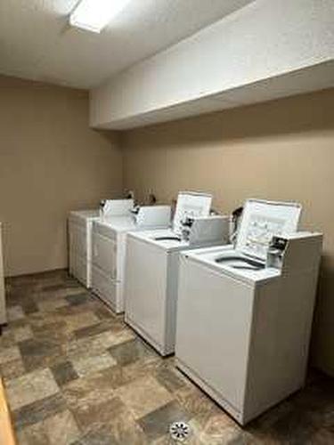 101-4601 48 Avenue, Red Deer, AB - Indoor Photo Showing Laundry Room