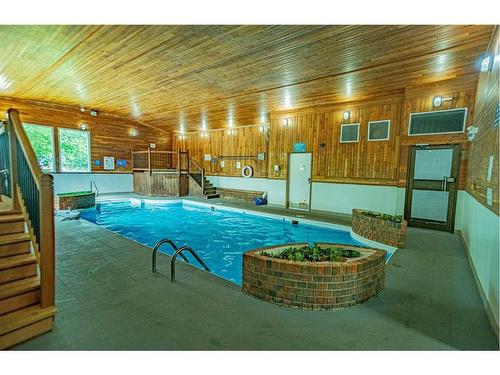 155-5140 62 Street, Red Deer, AB - Indoor Photo Showing Other Room With In Ground Pool