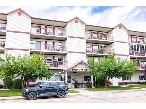 212-5020 49 Street, Rocky Mountain House, AB - Outdoor With Balcony With Facade
