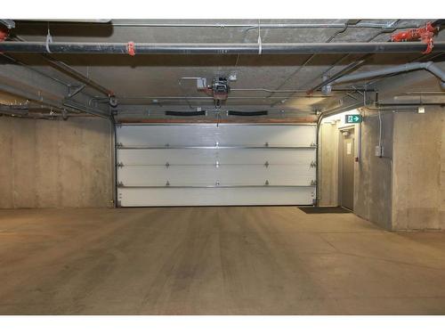 4801 Parkwood Road, Blackfalds, AB - Indoor Photo Showing Garage