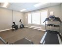 4801 Parkwood Road, Blackfalds, AB  - Indoor Photo Showing Gym Room 