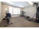 1-27-4801 Parkwood Road, Blackfalds, AB  - Indoor Photo Showing Gym Room 