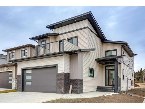 144 Emerald Drive, Red Deer, AB - Outdoor With Balcony With Facade