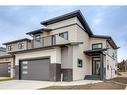 144 Emerald Drive, Red Deer, AB  - Outdoor With Balcony With Facade 