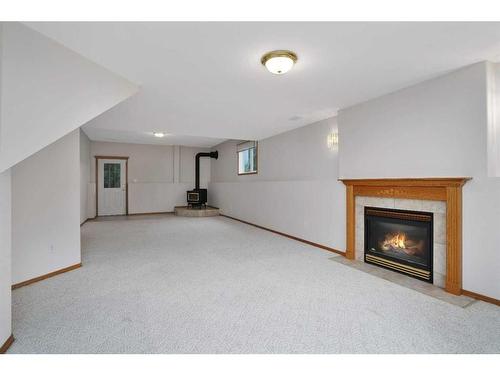 38269 Range Road 13, Rural Red Deer County, AB - Indoor With Fireplace