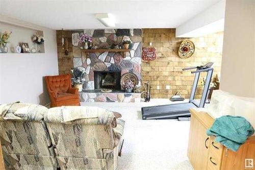 48327 Rge Rd 33, Warburg, AB - Indoor Photo Showing Living Room With Fireplace