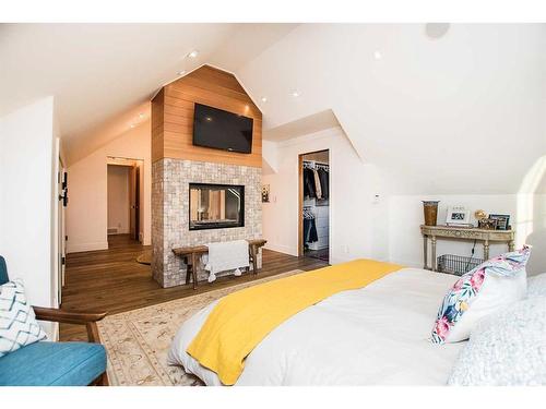 28044 Township Road 391 A, Rural Red Deer County, AB - Indoor Photo Showing Bedroom With Fireplace