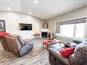 5011 C 49 Street, Stettler, AB  - Indoor Photo Showing Living Room With Fireplace 