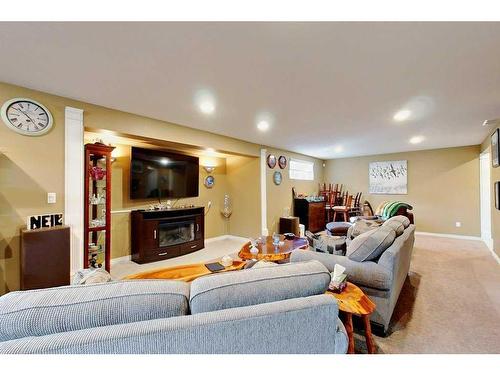 185 Alberts Close, Red Deer, AB - Indoor Photo Showing Basement With Fireplace