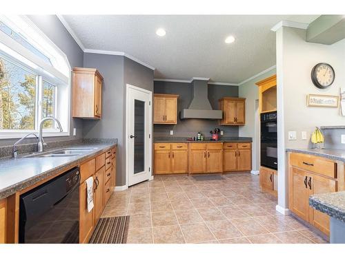 23304 374 Township, Rural Red Deer County, AB - Indoor Photo Showing Kitchen With Double Sink