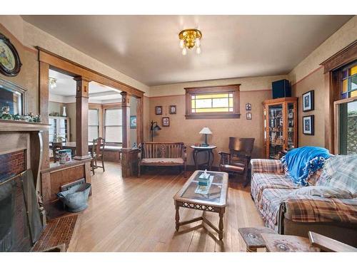 4803 50 Street, Lougheed, AB - Indoor Photo Showing Living Room With Fireplace