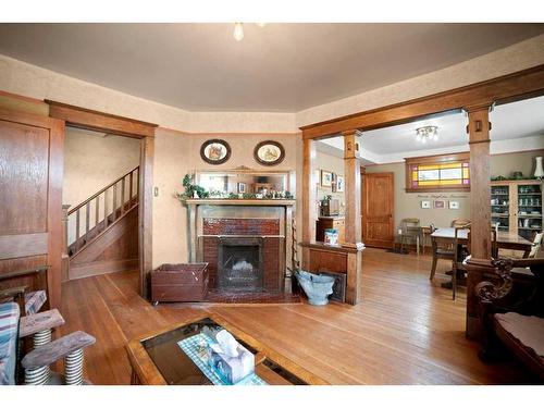 4803 50 Street, Lougheed, AB - Indoor Photo Showing Living Room With Fireplace