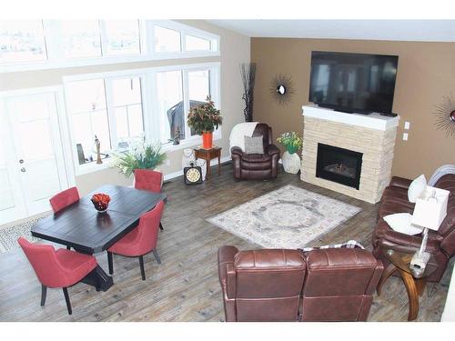 7014-35468 Range Road 30, Rural Red Deer County, AB - Indoor Photo Showing Living Room With Fireplace
