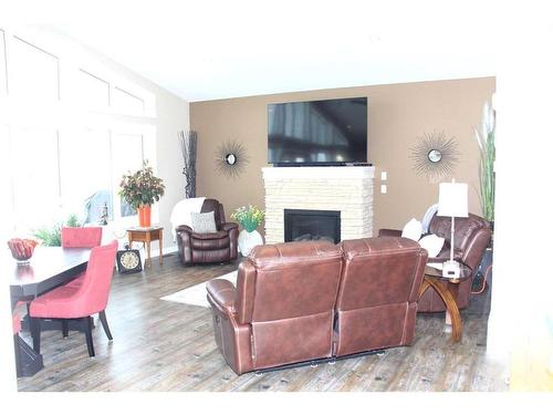 7014-35468 Range Road 30, Rural Red Deer County, AB - Indoor Photo Showing Living Room With Fireplace