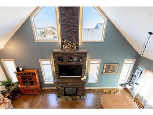 5761 51 Avenue, Innisfail, AB - Indoor With Fireplace