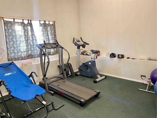 206-5428 51 Avenue, Rocky Mountain House, AB - Indoor Photo Showing Gym Room