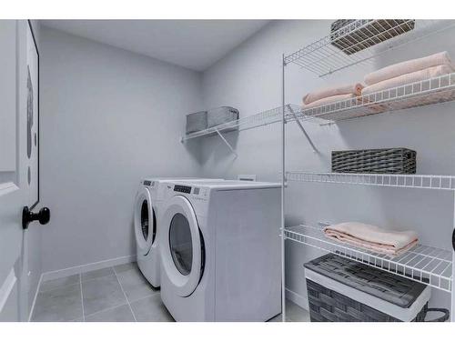 61 Belmont Park Sw, Calgary, AB - Indoor Photo Showing Laundry Room