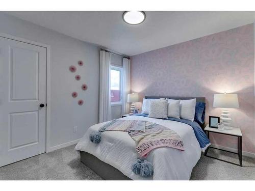 61 Belmont Park Sw, Calgary, AB - Indoor Photo Showing Bedroom