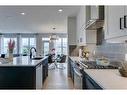 61 Belmont Park Sw, Calgary, AB  - Indoor Photo Showing Kitchen With Upgraded Kitchen 