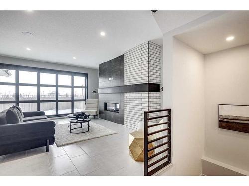 61 Thorkman Avenue, Red Deer, AB - Indoor Photo Showing Living Room With Fireplace