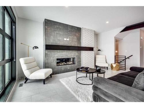 61 Thorkman Avenue, Red Deer, AB - Indoor Photo Showing Living Room With Fireplace