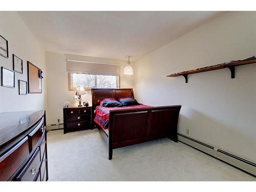 1323 596 Highway, Rural Red Deer County, AB - Indoor Photo Showing Bedroom