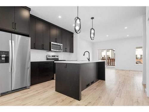 34 Earl Close, Red Deer, AB - Indoor Photo Showing Kitchen With Stainless Steel Kitchen With Upgraded Kitchen