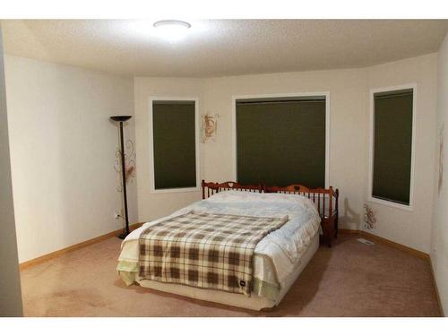 9 Panorama Hills Manor Nw, Calgary, AB - Indoor Photo Showing Bedroom