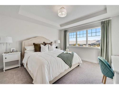 136 Emberside Hollow, Cochrane, AB - Indoor Photo Showing Bedroom