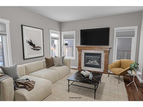 4403 Ryders Ridge Boulevard, Sylvan Lake, AB - Indoor Photo Showing Living Room With Fireplace